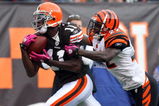 CLEVELAND - OCTOBER 04: Mohamed Massaquoi #11 of the Cleveland Browns makes a catch at the 1 yard line against Jonathan Joseph #22 of the Cincinnati Bengals during their game at Cleveland Browns Stadium on October 4, 2009 in Cleveland, Ohio.  (Photo by Jim McIsaac/Getty Images)