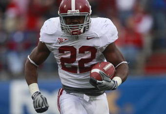 OXFORD, MS - OCTOBER 10: Mark Ingram #22 of the Alabama Crimson Tide runs for a 36-yard touchdown in their college football game against the Mississippi Rebels at Vaught-Hemingway Stadium on October 10, 2009 in Oxford, Mississippi. (Photo by Dave Martin/Getty Images)