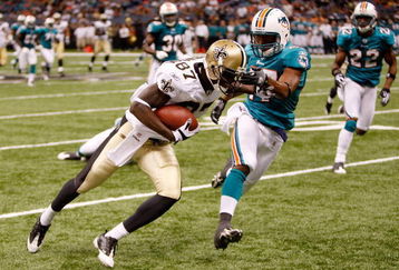 NEW ORLEANS - SEPTEMBER 03:  Adrian Arrington #87 of the New Orleans Saints gets past during the game against the Miami Dolphins at the Louisiana Superdome on September 3, 2009 in New Orleans, Louisiana.  (Photo by Chris Graythen/Getty Images)