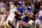 NEW ORLEANS - OCTOBER 18:  Roman Harper #41 of the New Orleans Saints forces a fumble by quarterback Eli Manning #10 of the New York Giants at the Louisiana Superdome on October 18, 2009 in New Orleans, Louisiana.  (Photo by Chris Graythen/Getty Images)