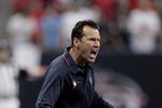 HOUSTON - OCTOBER 04:  Head coach Gary Kubiak of the Houston Texans yells at the official after a miscommunication on whether to except or decline a penalty at Reliant Stadium on October 4, 2009 in Houston, Texas.  (Photo by Bob Levey/Getty Images)