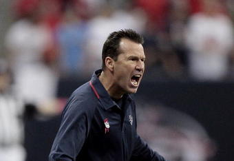 HOUSTON - OCTOBER 04:  Head coach Gary Kubiak of the Houston Texans yells at the official after a miscommunication on whether to except or decline a penalty at Reliant Stadium on October 4, 2009 in Houston, Texas.  (Photo by Bob Levey/Getty Images)