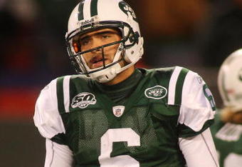 EAST RUTHERFORD, NJ - OCTOBER 18:  Ouarterback Mark Sanchez #6 of the New York Jets walks off the field dejected after failing to convert on third down in overtime against the Buffalo Bills at Giants Stadium in the Meadowlands on October 18, 2009 in East Rutherford, New Jersey. The Bills defeated the Jets 16-13 in overtime.  (Photo by Mike Stobe/Getty Images)
