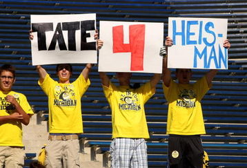 ANN ARBOR, MI - SEPTEMBER 19:  Fans of quarterback Tate Forcier #5 of the Michigan Wolverines hold signs promoting him before the game against the Eastern Michigan Eagles at Michigan Stadium on September 19, 2009 in Ann Arbor, Michigan.   Michigan won 45-17.  (Photo by Stephen Dunn/Getty Images)