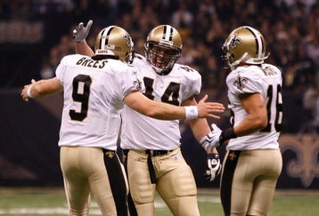 NEW ORLEANS - OCTOBER 18:  Drew Brees #9, Heath Evans #44 and Lance Moore #16 of the New Orleans Saints celebrate after scoring a touchdown against the New York Giants at the Louisiana Superdome on October 18, 2009 in New Orleans, Louisiana.  (Photo by Chris Graythen/Getty Images)