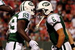 EAST RUTHERFORD, NJ - SEPTEMBER 3:  Quarterback MarkSanchez #6 and wide receiver Jerricho Cotchery #89 of the New York Jets celebrate a first quarter touchdown against the Philadelphia Eagles during the NFL preseason game at Giants Stadium on September 3, 2009 in East Rutherford, New Jersey. (Photo by Jim McIsaac/Getty Images)