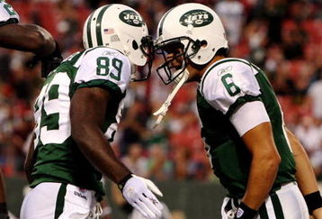 EAST RUTHERFORD, NJ - SEPTEMBER 3:  Quarterback MarkSanchez #6 and wide receiver Jerricho Cotchery #89 of the New York Jets celebrate a first quarter touchdown against the Philadelphia Eagles during the NFL preseason game at Giants Stadium on September 3, 2009 in East Rutherford, New Jersey. (Photo by Jim McIsaac/Getty Images)