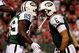EAST RUTHERFORD, NJ - SEPTEMBER 3: Quarterback MarkSanchez #6 and wide receiver Jerricho Cotchery #89 of the New York Jets celebrate a first quarter touchdown against the Philadelphia Eagles during the NFL preseason game at Giants Stadium on September 3, 2009 in East Rutherford, New Jersey. (Photo by Jim McIsaac/Getty Images)