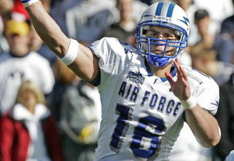 PROVO, UT - OCTOBER 29:  Quarterback Adam Fitch #16 of Air Force passes against Brigham Young University during the second quarter October 29, 2005 at LaVell Edwards Stadium in Provo, Utah. Fitch replaced Shaun Carney who cut his left hand and had to leave the game.  (Photo by George Frey/Getty Images)