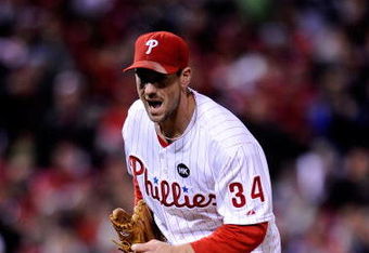 PHILADELPHIA - OCTOBER 18:  Cliff Lee #34 of the Philadelphia Phillies reacts to a strike out against the Los Angeles Dodgers during Game Three of the NLCS during the 2009 MLB Playoffs at Citizens Bank Park on October 18, 2009 in Philadelphia, Pennsylvania.  (Photo by Jeff Zelevansky/Getty Images)