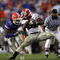 JACKSONVILLE, FL - OCTOBER 27:  Tailback Knowshon Moreno #24 of the Georgia Bulldogs runs the ball against Brandon Spikes #51 of the Florida Gators at Jacksonville Municipal Stadium on October 27, 2007 in Jacksonville, Florida.  (Photo by Ronald Martinez/Getty Images)