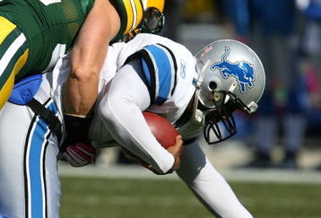 GREEN BAY, WI - OCTOBER 18: Duante Culpepper #11 of the Detroit Lions is sacked by Clay Matthews #52 of the Green Bay Packers at Lambeau Field on October 18, 2009 in Green Bay, Wisconsin. (Photo by Jonathan Daniel/Getty Images)