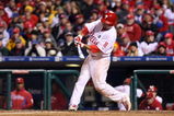 PHILADELPHIA - OCTOBER 18:  Shane Victorino #8 of the Philadelphia Phillies hits a three-run home run against the Los Angeles Dodgers in Game Three of the NLCS during the 2009 MLB Playoffs at Citizens Bank Park on October 18, 2009 in Philadelphia, Pennsylvania.  (Photo by Nick Laham/Getty Images)