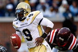 ATLANTA - OCTOBER 17:  Quarterback Josh Nesbitt #9 of the Georgia Tech Yellow Jackets rushes upfield against the Virginia Tech Hokies at Bobby Dodd Stadium on October 17, 2009 in Atlanta, Georgia.  (Photo by Kevin C. Cox/Getty Images)