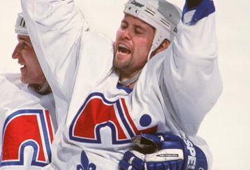 20 MAR 1995:  FORWARD OWEN NOLAN OF THE QUEBEC NORDIQUES CELEBRATES AFTER SCORING A GOAL DURING A 5-4 WIN OVER THE FLORIDA PANTHERS AT LE COLISEE, QUEBEC CITY, QUEBEC, CANADA. Mandatory Credit: Robert Laberge/ALLSPORT