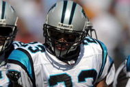 CHARLOTTE, NC - SEPTEMBER 28: Cornerback Dante Wesley #23 of the Carolina Panthers looks over at the sideline for some signals in the third quarter of the game against the Atlanta Falcons at Bank of America Stadium on September 28, 2008 in Charlotte, North Carolina. The Carolina Panthers won the game 24-9. (Photo by Steve Dykes/Getty Images)