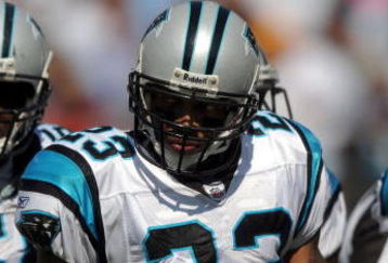 CHARLOTTE, NC - SEPTEMBER 28:  Cornerback Dante Wesley #23 of the Carolina Panthers looks over at the sideline for some signals in the third quarter of the game against the Atlanta Falcons at Bank of America Stadium on September 28, 2008 in Charlotte, North Carolina. The Carolina Panthers won the game 24-9. (Photo by Steve Dykes/Getty Images)