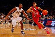 NEW YORK - MARCH 10:  Mike Rosario #3 of the Rutgers Scarlet Knights drives the ball against Tory Jackson #2 of the Notre Dame Fighting Irish during the first round of the Big East Tournament at Madison Square Garden on March 10, 2009 in New York City.  (Photo by Jim McIsaac/Getty Images)