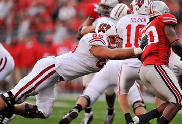 COLUMBUS, OH - OCTOBER 10:  Offensive lineman Gabe Carimi #68 of the Wisconsin Badgers blocks against the Ohio State Buckeyes at Ohio Stadium on October 10, 2009 in Columbus, Ohio.  (Photo by Jamie Sabau/Getty Images)