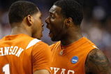 GREENSBORO, NC - MARCH 21:  Damion James #5 of the Texas Longhorns reacts to Gary Johnson #1 against the Duke Blue Devils during the second round of the NCAA Division I Men's Basketball Tournament at the Greensboro Coliseum on March 21, 2009 in Greensboro, North Carolina.  (Photo by Streeter Lecka/Getty Images)