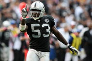 OAKLAND, CA - OCTOBER 18:  Thomas Howard #53 of the Oakland Raiders celebrates after a play against the Philadelphia Eagles during an NFL game at the Oakland-Alameda County Coliseum on October 18, 2009 in Oakland, California.  (Photo by Jed Jacobsohn/Getty Images)