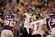 MINNEAPOLIS - OCTOBER 18:  Quarterback Joe Flacco #5 of the Baltimore Ravens delivers a pass against the Minnesota Vikings during NFL action at Hubert H. Humphrey Metrodome on October 18, 2009 in Minneapolis, Minnesota.The Vikings defeated the Ravens 33-31.  (Photo by Doug Pensinger/Getty Images)