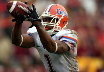 TALLAHASSEE, FL - NOVEMBER 29:  Receiver Percy Harvin #1 of the Florida Gators takes a direct snap and runs for a touchdown  against the Florida State Seminoles at Bobby Bowden Field at Doak Campbell Stadium on November 29, 2008 in Tallahassee, Florida.  The Gators defeated the Seminoles 45-15.  (Photo by Marc Serota/Getty Images)
