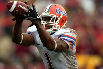 TALLAHASSEE, FL - NOVEMBER 29:  Receiver Percy Harvin #1 of the Florida Gators takes a direct snap and runs for a touchdown  against the Florida State Seminoles at Bobby Bowden Field at Doak Campbell Stadium on November 29, 2008 in Tallahassee, Florida.  The Gators defeated the Seminoles 45-15.  (Photo by Marc Serota/Getty Images)