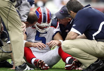 GLENDALE, AZ - OCTOBER 05: Starting Quarterback Trent Edwards #5 of the Buffalo Bills suffers a concussion after getting hit by Strong Safety Adrian Wilson #24 of the Arizona Cardinals during the first half of their NFL Game on October 5, 2008 at Stadium in Glendale, Arizona. (Photo by Donald Miralle/Getty Images)