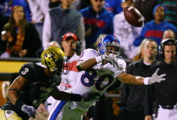 BOULDER, CO - OCTOBER 17: Dezmon Briscoe #80 of the Kansas Jayhawks reaches for a pass against Jimmy Smith #3 of the Colorado Buffaloes at Folsom Field on October 17, 2009 in Boulder, Colorado. (Photo by Garrett W. Ellwood/Getty Images)
