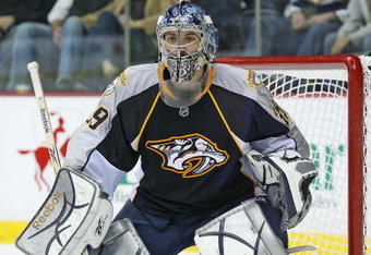 NASHVILLE, TN - OCTOBER 12:  Goalie Dan Ellis #39 of the Nashville Predators defends against the Edmonton Oilers on October 12, 2009 at the Sommet Center in Nashville, Tennessee.  (Photo by Frederick Breedon/Getty Images)