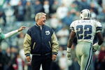 25 Nov 1999: Coach Jimmy Johnson of the Miami Dolphins talks to Emmitt Smith #22 of the Dallas Cowboys as he walks onto the field during the game at the Texas Stadium in Irving, Texas. The Cowboys defeated the Dolphins 20-0.