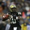 NASHVILLE, TN - DECEMBER 31: Larry Smith #10 of the Vanderbilt Commodores passes against the Boston College Eagles during the Gaylord Hotels Music City Bowl at LP Field on December 31, 2008 in Nashville, Tennessee. (Photo by Andy Lyons/Getty Images)