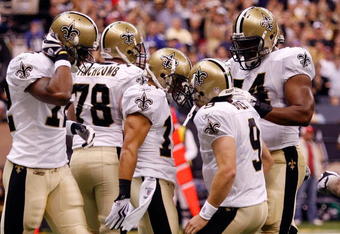 NEW ORLEANS - OCTOBER 18:  Drew Brees #9 celebrates with Lance Moore #16 of the New Orleans Saints after scoring a touchdown against the New York Giants at the Louisiana Superdome on October 18, 2009 in New Orleans, Louisiana.  (Photo by Chris Graythen/Getty Images)