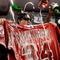ANAHEIM, CA - SEPTEMBER 28:  Los Angeles Angels of Anaheim players douse the jersey of teammate pitcher Nick Adenhart #34 in beer and champagne as they celebrate after winning the American League West title in the baseball game against the Texas Rangers at Angel Stadium on September 28, 2009 in Anaheim, California. Adenhart was killed in a accident by an alleged drunk driver during the beginning of the season.  (Photo by Kevork Djansezian/Getty Images)