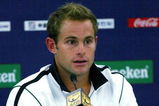 SHANGHAI, CHINA - OCTOBER 13:  Andy Roddick of the United States fields questions from the media at a press conference after retiring from his match against Stanilas Wawrinka of Switzerland during the 2009 Shanghai ATP Masters 1000 at Qi Zhong Tennis Centre on October 13, 2009 in Shanghai, China.  (Photo by Matthew Stockman/Getty Images)