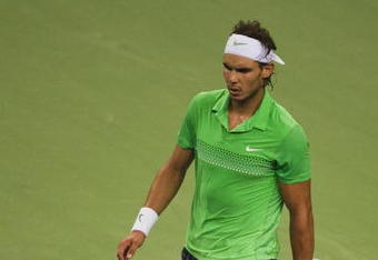 SHANGHAI, CHINA - OCTOBER 18:  Rafael Nadal of Spain reacts to a lose point to Nikolay Davydenko of Russia during the final on day eight of 2009 Shanghai ATP Masters 1000 at Qi Zhong Tennis Centre on October 18, 2009 in Shanghai China.  (Photo by Victor Fraile/Getty Images)