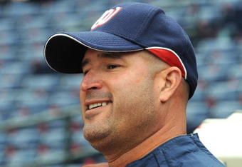 ATLANTA - APRIL 11: Manager Manny Acta #14 of  the Washington Nationals watches batting practice before play against the Atlanta Braves on April 11, 2009 at Turner Field in Atlanta, Georgia.  (Photo by Al Messerschmidt/Getty Images) 
