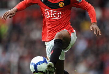MANCHESTER, ENGLAND - OCTOBER 17: Patrice Evra of Manchester United in action during the Barclays Premier League match between Manchester United and Bolton Wanderers at Old Trafford on October 17, 2009 in Manchester, England.  (Photo by Laurence Griffiths/Getty Images)