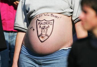 OAKLAND, CA - DECEMBER 5:  A devoted Raiders fan looks on during the game between the Oakland Raiders and the Kansas City Chiefs at Network Associates Coliseum on December 5, 2004 in Oakland, California.  (Photo by Jed Jacobsohn/Getty Images)