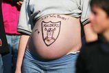 OAKLAND, CA - DECEMBER 5:  A devoted Raiders fan looks on during the game between the Oakland Raiders and the Kansas City Chiefs at Network Associates Coliseum on December 5, 2004 in Oakland, California.  (Photo by Jed Jacobsohn/Getty Images)