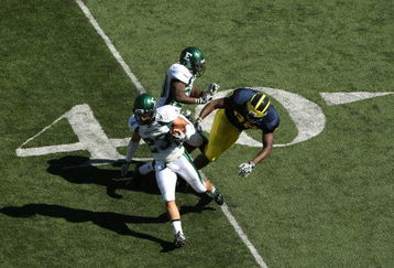 ANN ARBOR, MI - SEPTEMBER 19:  Safety Chris May #23 of the Eastern Michigan Eagles returns his interception against the Michigan Wolverines at Michigan Stadium on September 19, 2009 in Ann Arbor, Michigan.  Michigan won 45-17.  (Photo by Stephen Dunn/Getty Images)