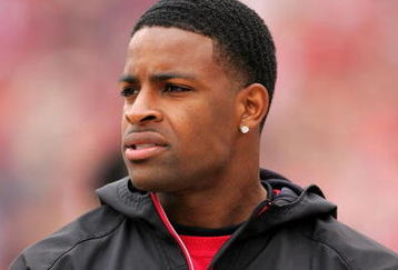 SAN FRANCISCO - OCTOBER 11:  Michael Crabtree, the San Francisco 49ers first round draft pick, watches the 49ers game against the Atlanta Falcons on the sidelines at Candlestick Park on October 11, 2009 in San Francisco, California.  (Photo by Ezra Shaw/Getty Images)
