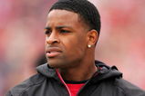 SAN FRANCISCO - OCTOBER 11:  Michael Crabtree, the San Francisco 49ers first round draft pick, watches the 49ers game against the Atlanta Falcons on the sidelines at Candlestick Park on October 11, 2009 in San Francisco, California.  (Photo by Ezra Shaw/Getty Images)