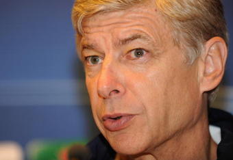 AMSTERDAM, NETHERLANDS - OCTOBER 19:  Arsene Wenger, manager of Arsenal, talks to the media during a press conference at the Sheraton Amsterdam Airport Hotel on October 19, 2009 in Amsterdam, Netherlands.  (Photo by Michael Regan/Getty Images)