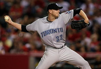 ANAHEIM, CA - MAY 6:  Roy Halladay #32 of the Toronto Blue Jays throws a pitch against the Los Angeles Angels of Anaheim at Angel Stadium May 6, 2009 in Anaheim, California.  (Photo by Stephen Dunn/Getty Images)