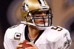 NEW ORLEANS - OCTOBER 18:  Drew Brees #9 of the New Orleans Saints throws a pass against the New York Giants at the Louisiana Superdome on October 18, 2009 in New Orleans, Louisiana.  The Saints defeated the Giants 48-27.  (Photo by Chris Graythen/Getty Images)