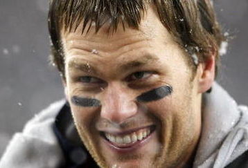 FOXBORO, MA - OCTOBER 18:  Tom Brady #12 of the New England Patriots stands on the sideline in the fourth quarter against the Tennessee Titans on October 18, 2009 at Gillette Stadium in Foxboro, Massachusetts. The Patriots defeated the Titans 59-0.  (Photo by Elsa/Getty Images)