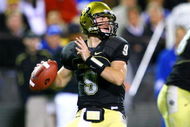 BOULDER, CO - OCTOBER 17: Tyler Hansen #9 of the Colorado Buffaloes looks to throw the ball against the Kansas Jayhawks during the game at Folsom Field on October 17, 2009 in Boulder, Colorado. (Photo by Garrett W. Ellwood/Getty Images)