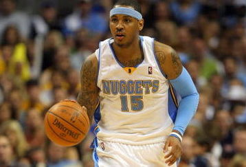 DENVER - MAY 29:  Carmelo Anthony #15 of the Denver Nuggets moves the ball in Game Six of the Western Conference Finals during the 2009 NBA Playoffs against the Los Angeles Lakers at Pepsi Center on May 29, 2009 in Denver, Colorado. NOTE TO USER: User expressly acknowledges and agrees that, by downloading and or using this photograph, User is consenting to the terms and conditions of the Getty Images License Agreement.  (Photo by Doug Pensinger/Getty Images)